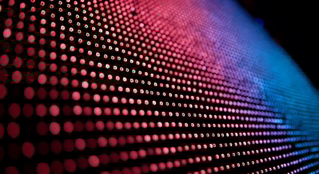 A close up of a colorful display of dots photo