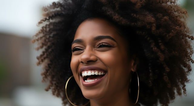 A woman with an afro smile photo