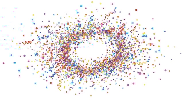 A circle of colorful confetti on a white background photo