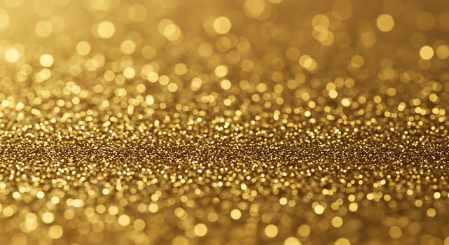Gold glitter background with a lot of sparkles photo