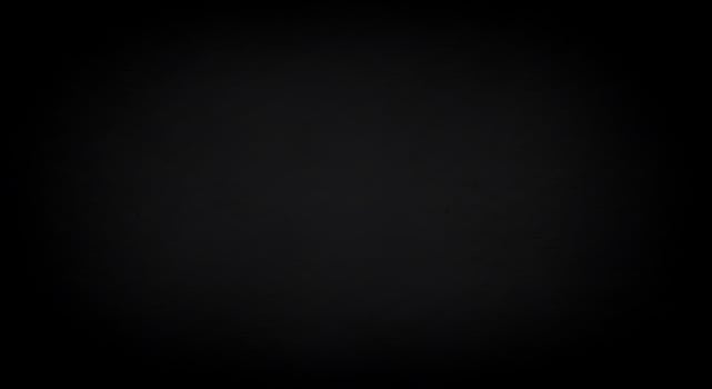 Black background with a white light in the middle photo