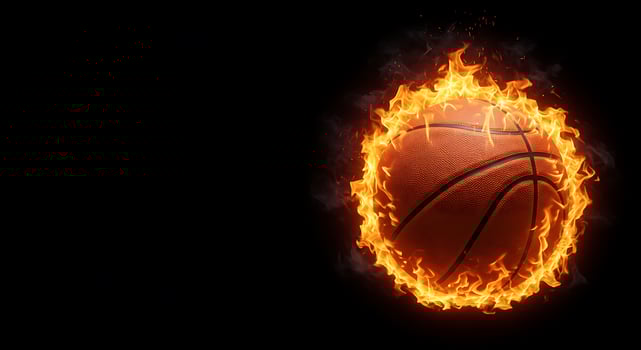Basketball ball in fire on black background photo