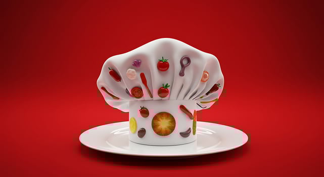 A chef hat on a plate with a red background photo