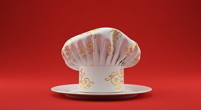 A chef hat on a plate photo