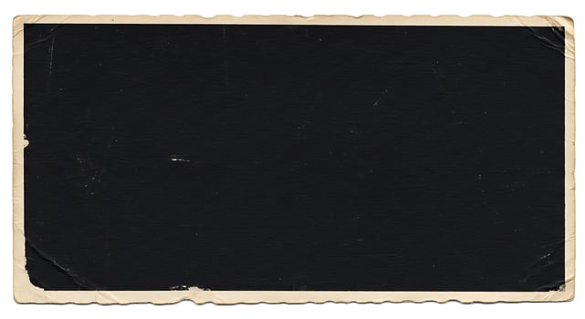 An old black photo frame with a white border