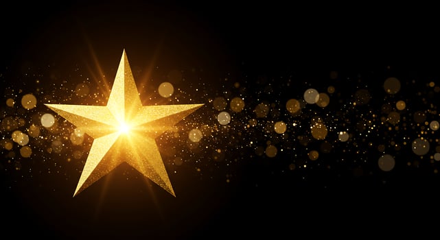 Golden star on black background with sparkles photo