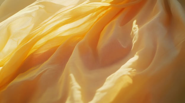 Golden Yellow Fabric Draped in Sunlight photo