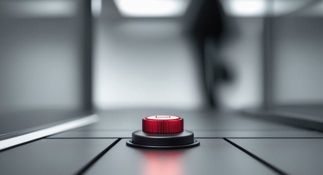 A Critical Decision. Red Button in Focus, Abstract Figure in the Background. photo