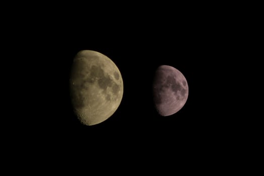 Twin crescent moons in the night sky detail light photo