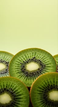 Captivating close up of sliced kiwi fruit, revealing the delicious green interior. photo
