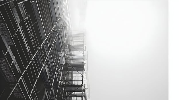 A black and white photo of scaffolding on a building