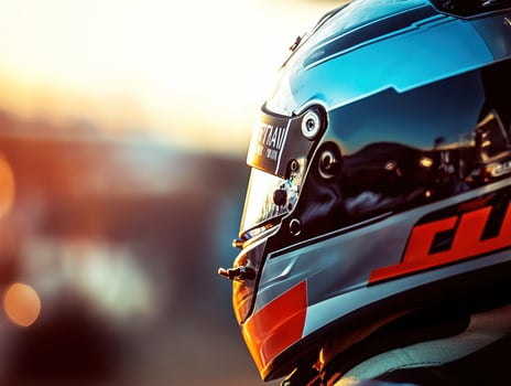Racing driver prepares for competition at sunset on racetrack photo