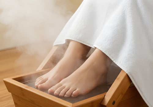 Feet in wooden foot spa photo