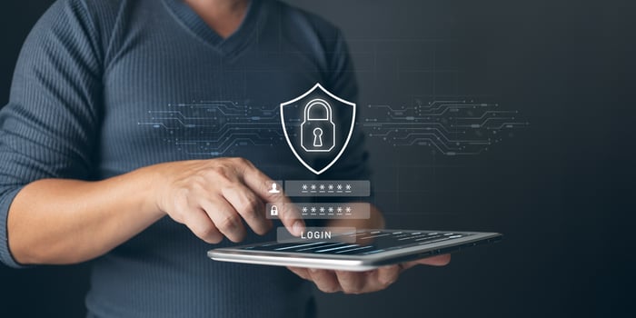 Cybersecurity and privacy concepts to protect data. Lock icon and internet network security technology. Businessman protecting personal data on laptop with virtual screen interfaces. photo