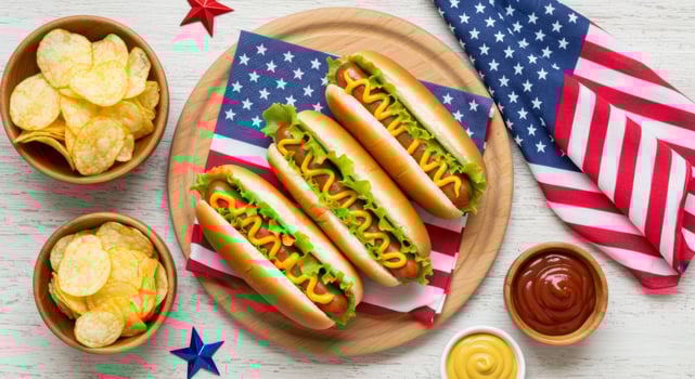 Festive American Hot Dogs Display with Flag and Chips for Celebration photo
