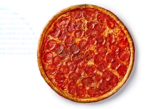 Top view of a whole pepperoni pizza showing its cheesy and spicy goodness photo