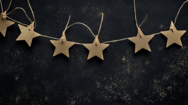 Gold Glitter Stars on Dark Background Festive Holiday Decoration photo