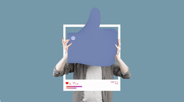 A person holds a large thumbs up symbol in front of a stylized social media frame, reflecting an online presence. This collage highlights engagement in content creation and influencer culture. photo