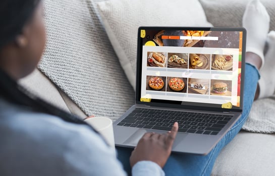 Food Delivery. Black Woman Using Laptop Ordering Fastfood Meals Online On Restaurant Website Sitting On Sofa At Home. Lunch Delivering, Internet Cafe Service Concept. Collage, Cropped photo