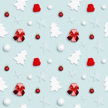 Christmas flat lay with winter decor, red toys ball and warm cap, snowballs, stars, white wooden christmas tree photo
