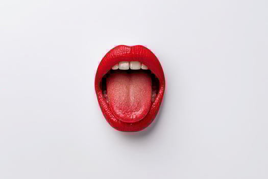 Bold red lips and a tongue displayed on a clean white background with creative flair photo