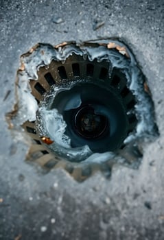 hole in the ground that is filled with water photo