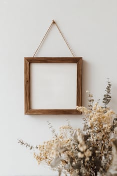Wooden frame mockup on white wall photo