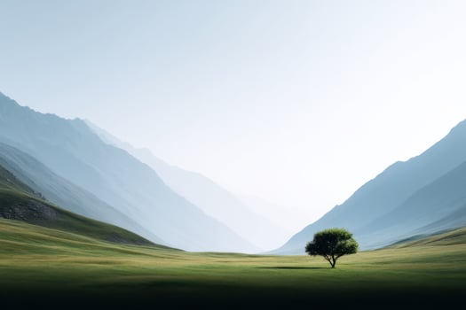 Serene Mountain Valley Landscape with a Solitary Tree A Peaceful Nature Scene photo