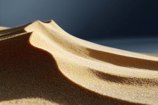 Close-up of undulating sand dunes. Soft, golden sand waves photo