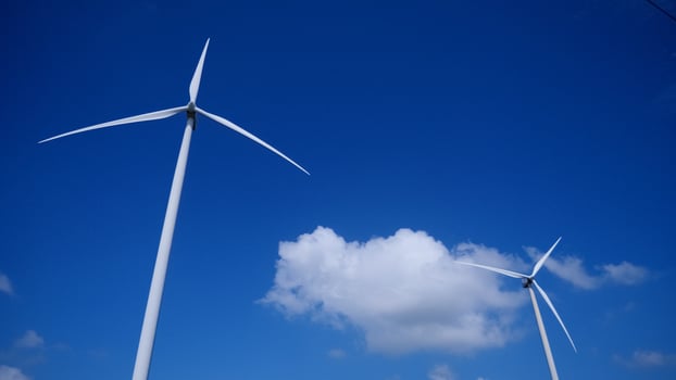 Wind turbines in the blue sky photo