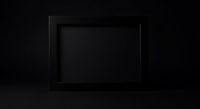 Black empty frame on a dark background photo