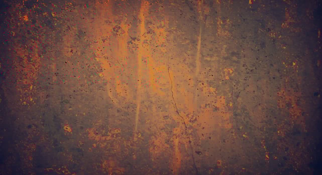 Grunge texture background with orange and black paint photo