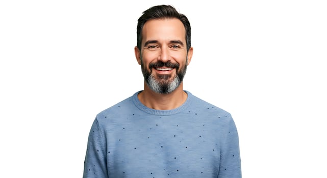 A man with a beard and a blue sweater photo