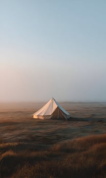 Solitude in the wild serene camping adventure under vast sky enjoying peaceful escapade surrounded nature's embrace photo