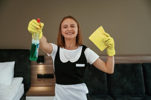 Surface cleaning conception., Young chambermaid is in hotel,, room photo