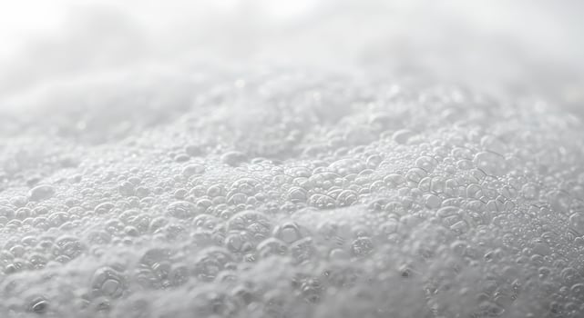 A close up of a white substance with bubbles photo