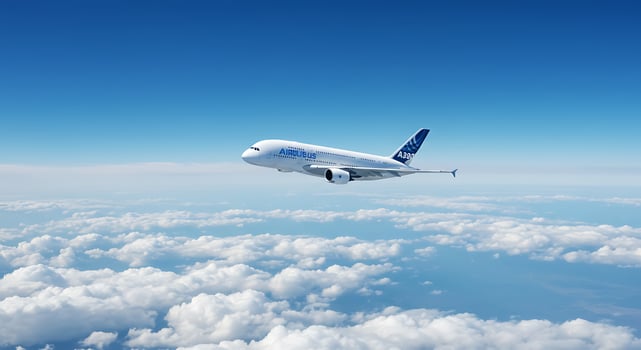 A large passenger jet flying in the sky photo