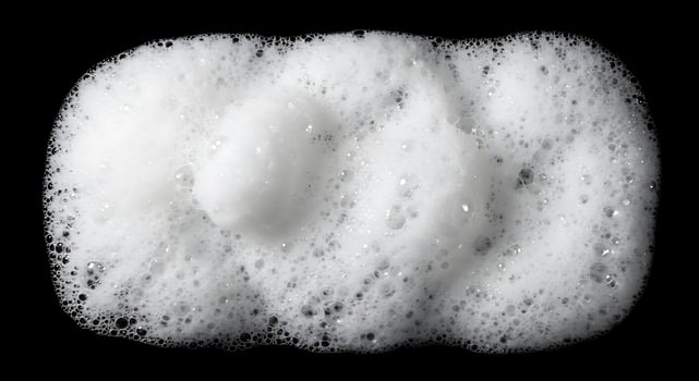 A close up of a white soap bubble photo