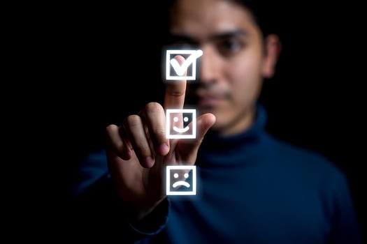 Person selecting positive feedback or agreement with glowing checkmark icon demonstrating customer satisfaction and approval ratings photo