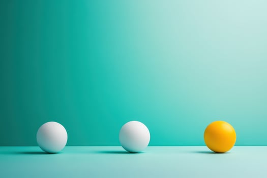 Colorful balls arranged on a solid background photo
