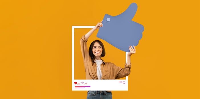 A content creator enthusiastically holds a large thumbs up icon against a vibrant yellow backdrop. She embodies positivity and engagement typical of social media influencers. photo