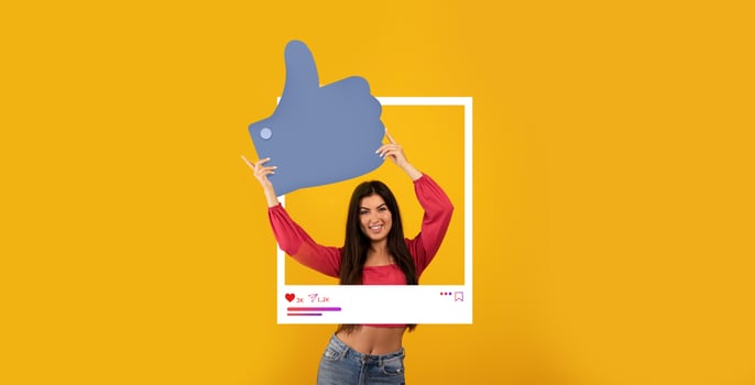 An influencer poses joyfully with a large thumbs up icon, surrounded by a bright yellow background. The setting emphasizes social media engagement, radiating positivity and connection. photo