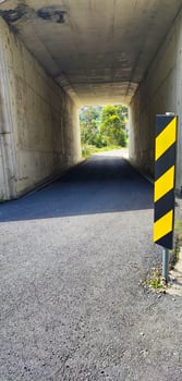 Close-up of emergency signs at the tunnel entrance in a Portugal. road construction concept. safety engineering, warning signals, collapse photo