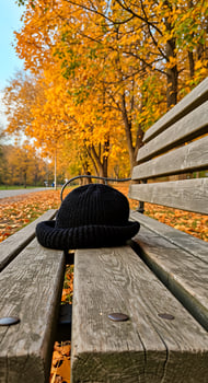 A bench with a hat on it photo
