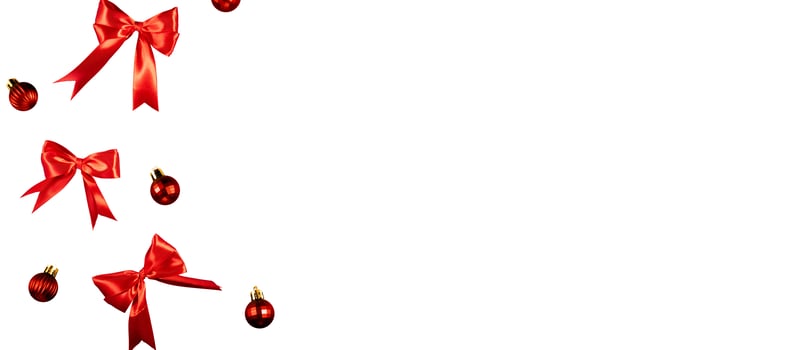red bow ribbon with balls for banner background photo