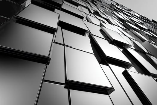 Black and white photo of a building with many windows