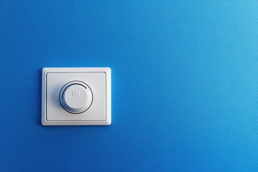 Control knob on a blue wall enhances decor photo