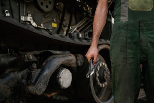 Holding wrench. Mechanic's, hand ,fixing machinery in workshop photo