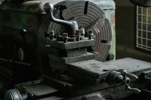 Vintage industrial lathe in an old workshop setting photo