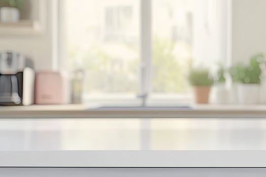 White kitchen counter with blurred background photo